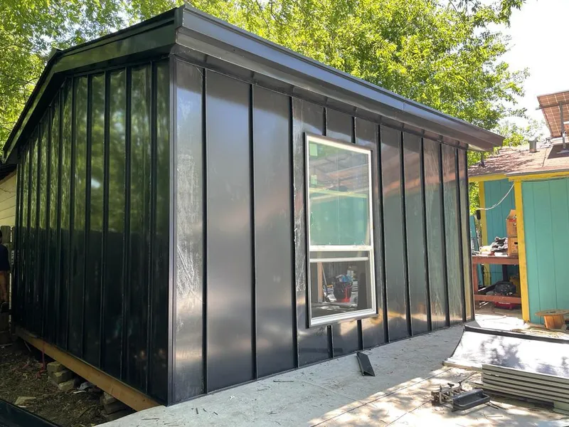 Black standing seam metal wall panels for Metal Roof Installation in Holland