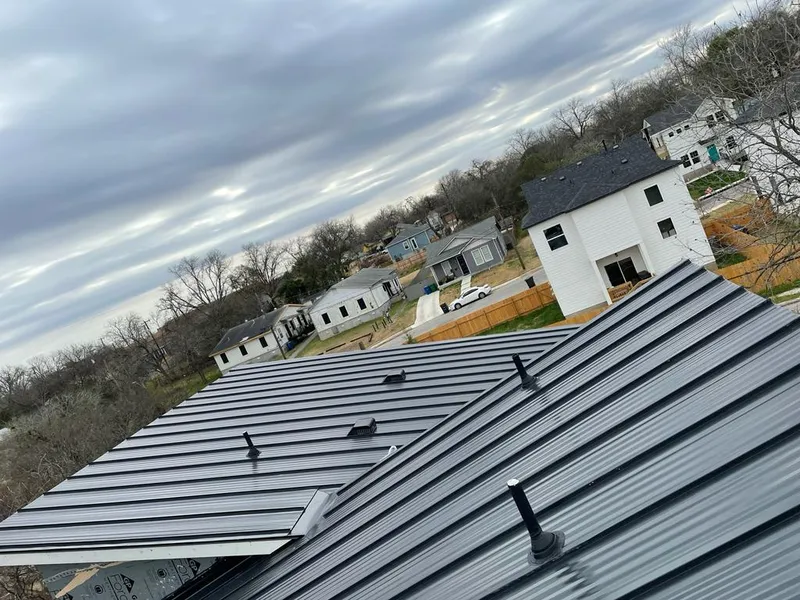 Standing seam metal roof panels with vents for Skylight Repair in Holland